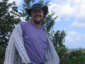Scott atop the high temple at Lamanai